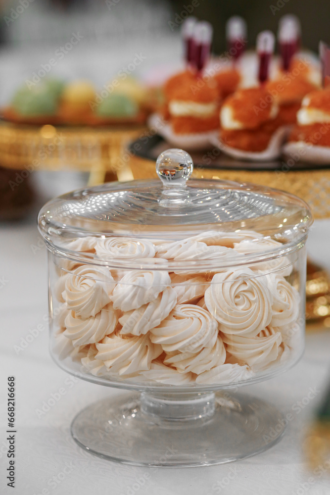 Marshmallows. Candy bar. Table with sweets, candies, and dessert. Close up. Wedding event