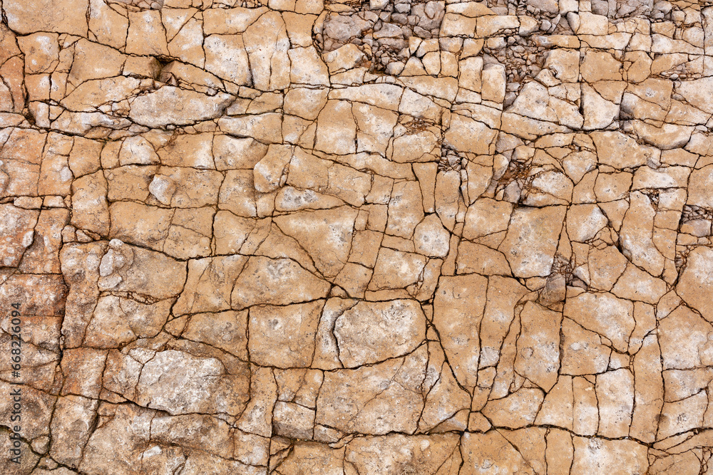 Cracked rock surface texture background