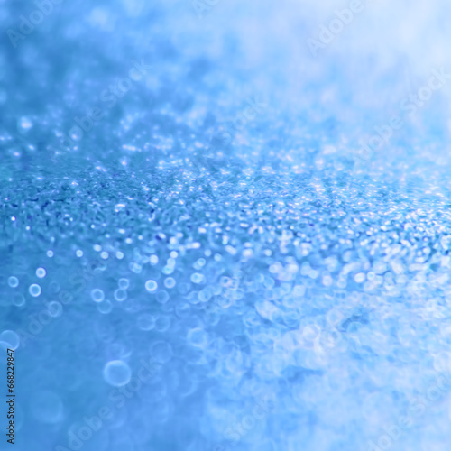 blue glitter sparkling festive background, selective focus