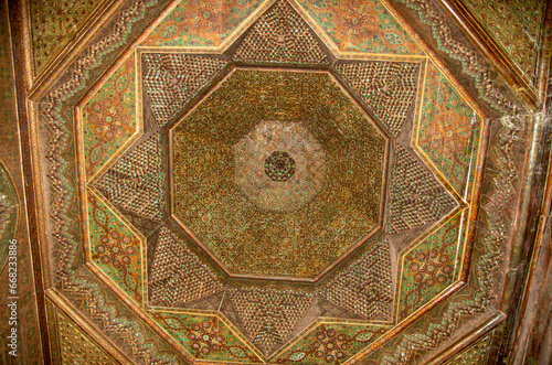Decorative ceiling of carved mahogany and ivory in Telouet Kasbah in Morocco