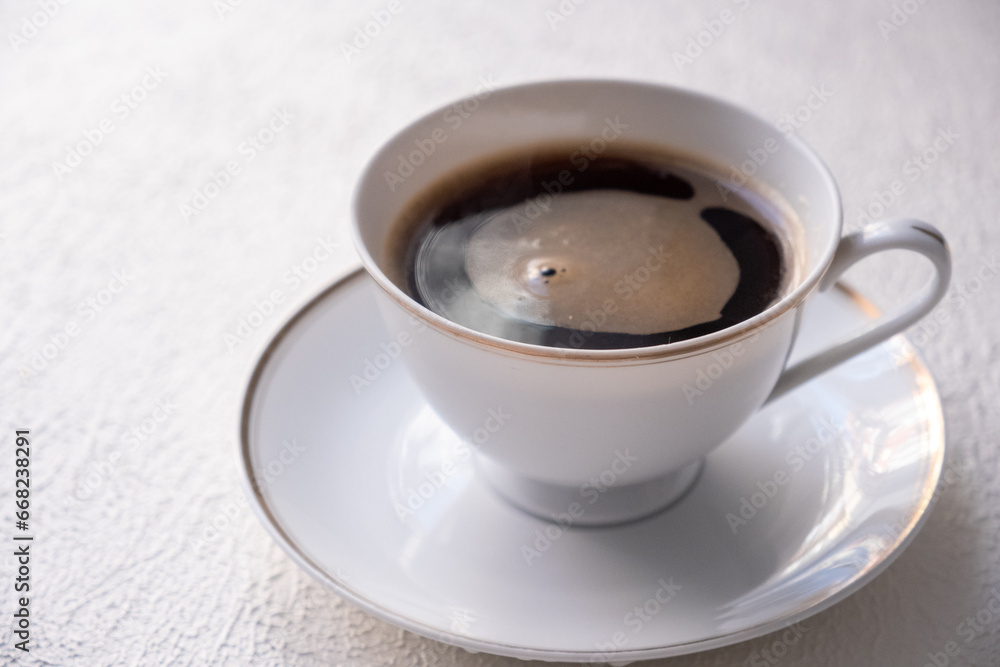Fototapeta premium cup of coffee on a white background