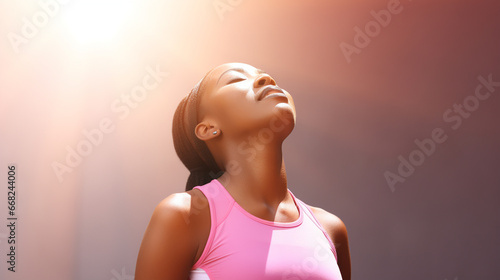 Young woman in pink sports ...