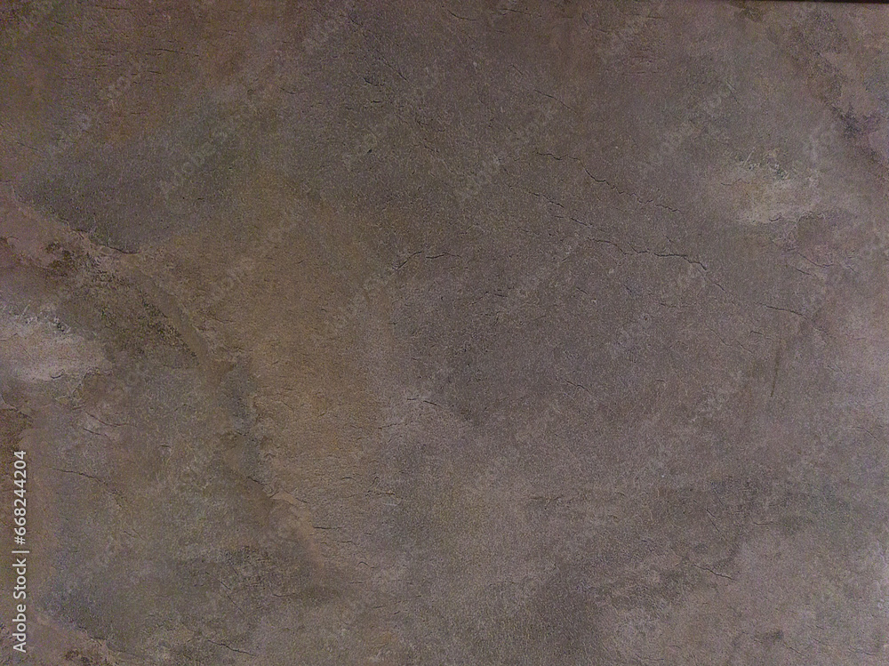Gray blurred surface. Gray background with an abstract pattern. Concrete floor.