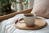 cosy comfort easy lifestyle hot coffee drink mug ceramic cup onwhite soft bed and blanket home interior background