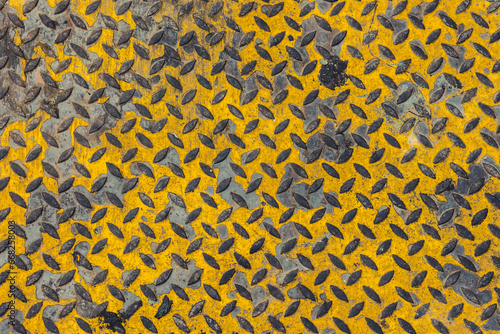 old grunge dirty steel pavement anti slip ground floor yellow color in heavy industry texture pattern for background
