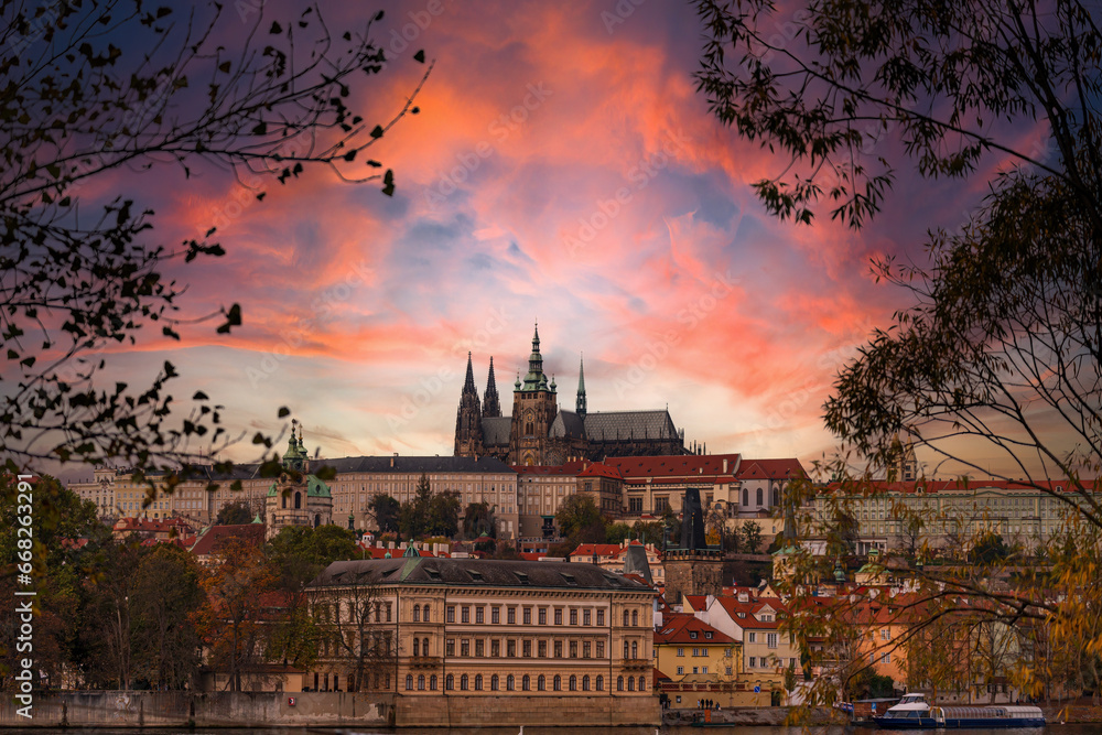 Naklejka premium Amazing sunset sky with Hradcin and Charles Bridge over Vltava river in Prague, Czech Republic.