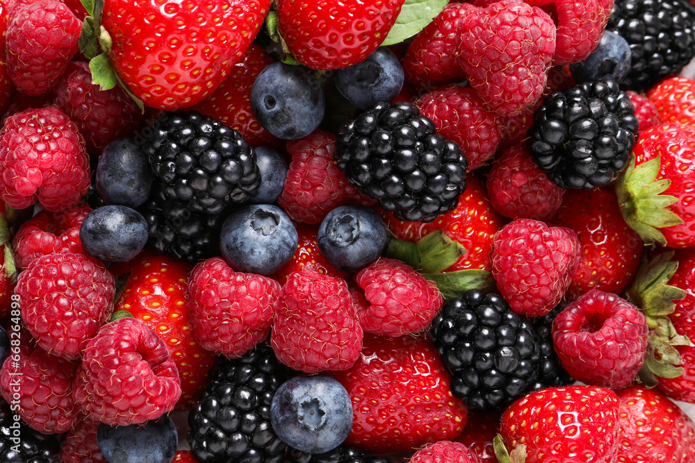Different fresh ripe berries as background, top view Different fresh ripe berries as background, top view