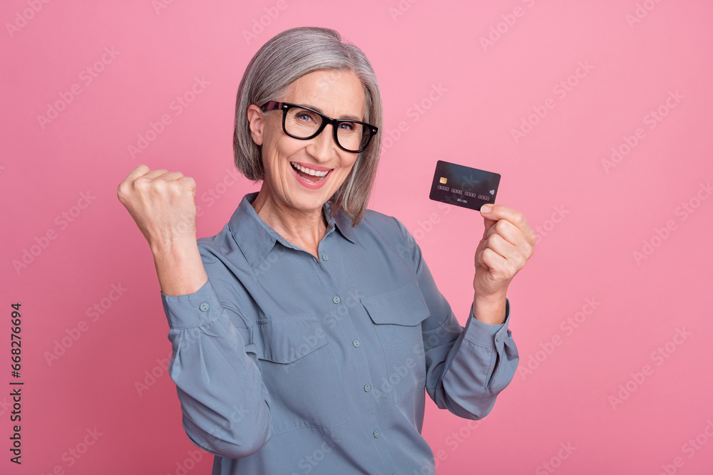 Photo of overjoyed glad successful lady wear stylish clothes rejoice salary transactions transfer isolated on pink color background Photo of overjoyed glad successful lady wear stylish clothes rejoice salary transactions transfer isolated on pink color background