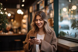 Digital Cafe Culture: Girl Enjoying Her Phone