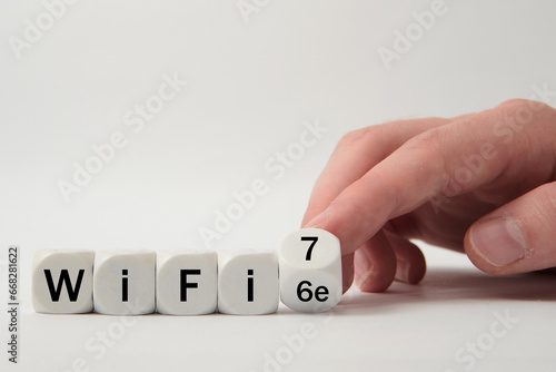 Hand turns dice and changes the expression 