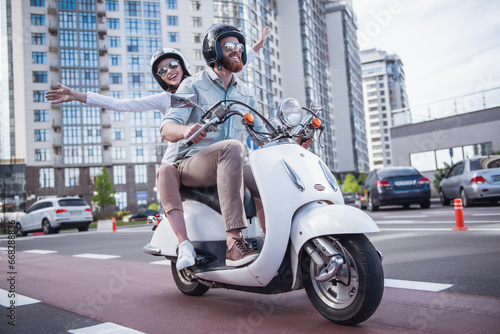 Couple on scooter