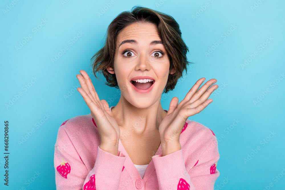 Photo of cheerful funky girl wear trendy clothes have fun celebrate holiday rejoice special offer isolated on blue color background Photo of cheerful funky girl wear trendy clothes have fun celebrate holiday rejoice special offer isolated on blue color background