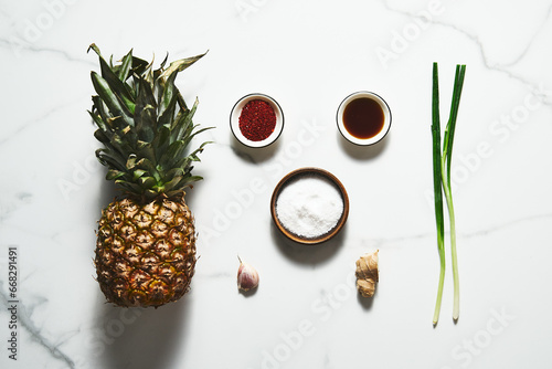 Fermented Pineapple kimchi. With garlic, gochugaru pepper and fish sauce. Pickled pineapple. photo