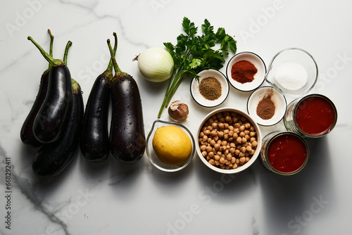 Maghmour or Lebanese moussaka. Dish made from baked or fried eggplant with spices, chickpeas and tomato sauce. Eggplants are stewed in tomato sauce