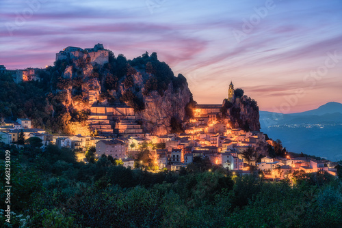 The beautiful village of Bagnoli del Trigno illuminated at sunset. Province of Isernia, Molise, Italy. photo
