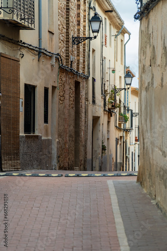 Fototapeta Naklejka Na Ścianę i Meble -  Empty street in the old town, in Almudaina, Alicante (Spain)
