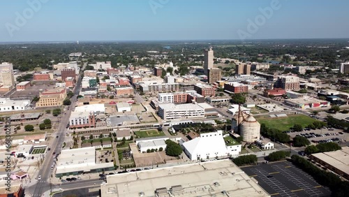Waco, TX - Oct 2023: Aerial footage flying over silos and Waco Texas.