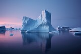 Icebergs drifting in the moonlit arctic sea.