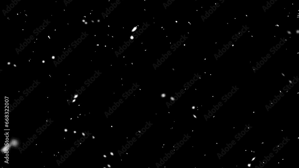 Falling snow isolated on black background. Falling snow at night. Bokeh lights on black background, flying snowflakes in the air. Winter weather. Overlay texture.