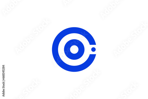 CO letter logo with circle shape in flat blue color