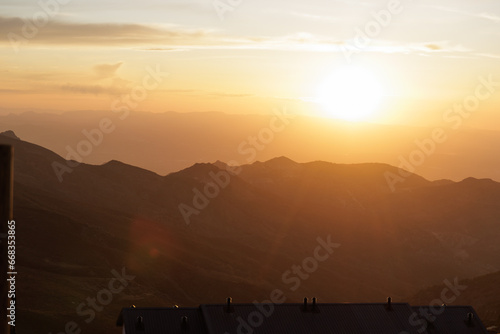 Landscape of distant Sierra Nevada mountains in Granada at sunset, Spain