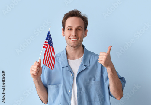 Young man with USA flag sho...