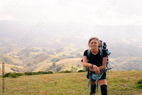 girl Hiker on countryside landscape in the Pyrenees, Pyrenees in France.