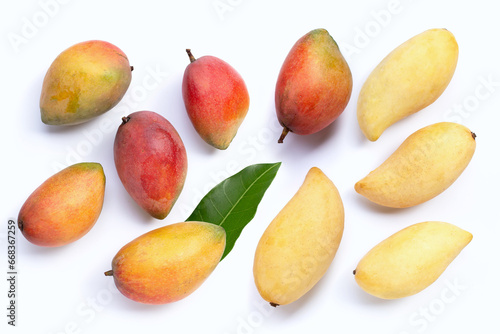 Tropical fruit, Mango with leaf on white background. Top view