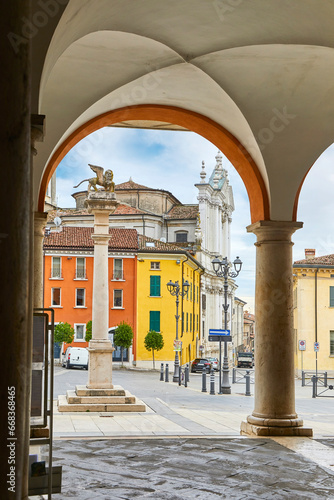 View of the market square of Lonato del Garda, with the column of the Venetian Lion, in Brescia, Italy. 