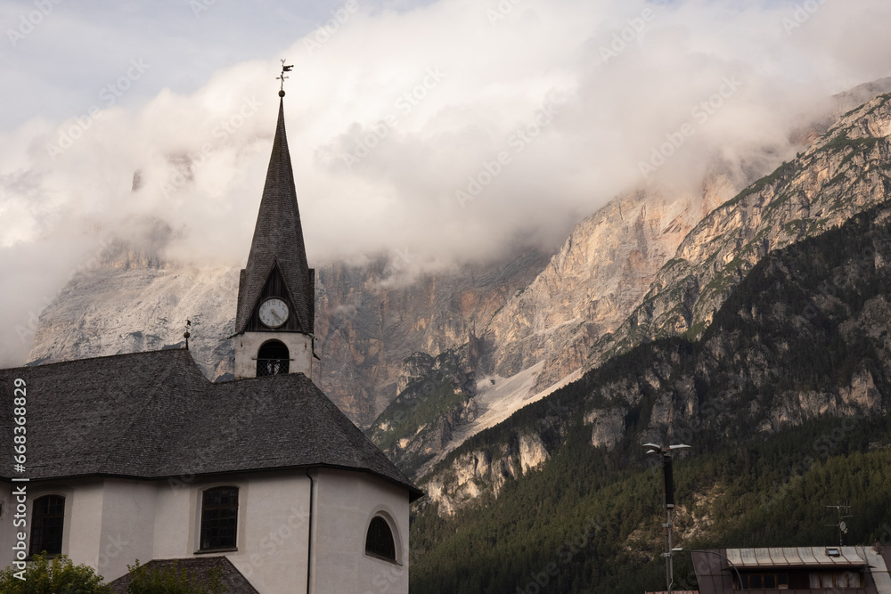 Italian church beneath Dolomites' majesty