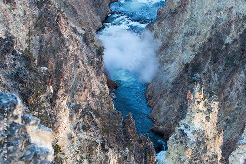 Puffs of steam and rapids in the Grand Canyon of the Yellowstone, Wyoming, USA