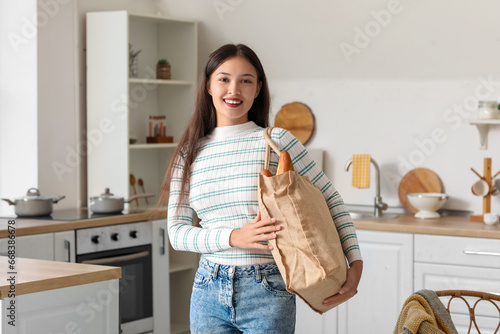 Young Asian woman with eco ...