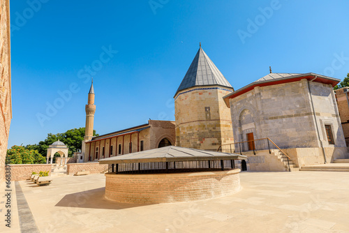 Alaeddin Keykubad Mosque in Konya is embraced by a spacious courtyard bordered by elegant colonnades, offering serene escape from the city's hustle. Inviting visitors to explore its spiritual essence. photo