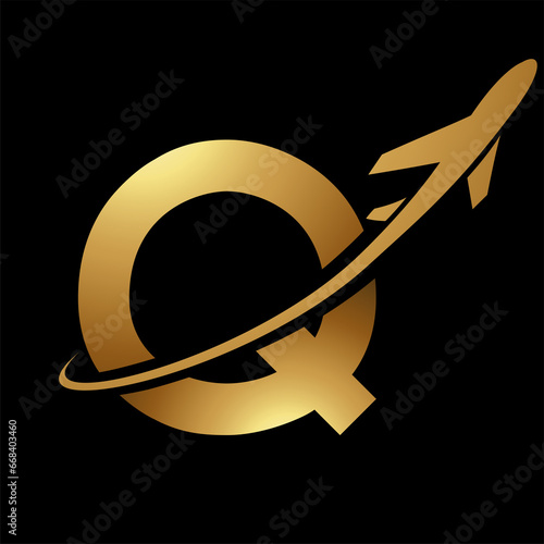 Glossy Gold and Black Uppercase Letter Q Icon with an Airplane