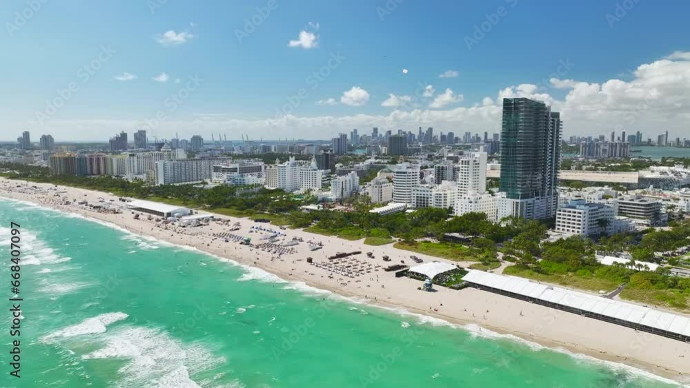 View from above of American southern seashore of Miami Beach city. South Beach high luxurious hotels and apartment buildings. Tourist infrastructure in southern Florida, USA View from above of American southern seashore of Miami Beach city. South Beach high luxurious hotels and apartment buildings. Tourist infrastructure in southern Florida, USA