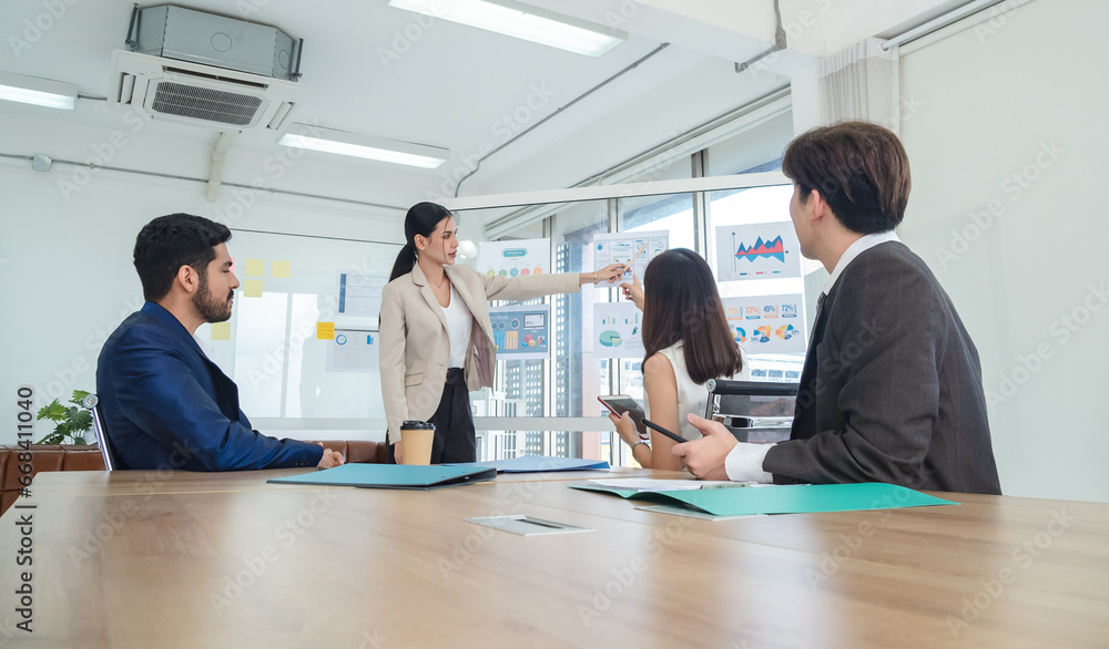 Fototapeta premium Portrait business team woman girl and man Asian group meeting sitting and standing looking hand holding pen notebook ready for Presenting creative idea job work success online sale inside office