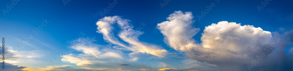 Panorama vivid sky.Panorama of a twilight sunset and colorful clouds - sunlight with dramatic cloud. Evening dusk good weather natural background.Panaramic Landscape.
