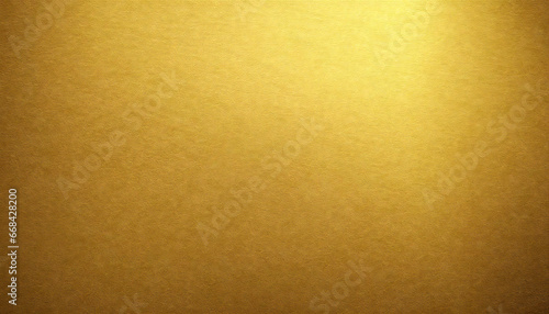 A luxurious golden background material. Textured gold gradient background material. photo