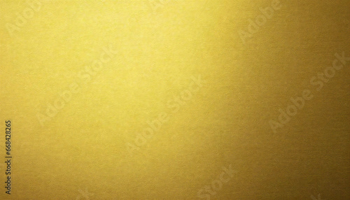 A luxurious golden background material. Textured gold gradient background material.
