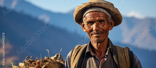 Nepalese wearing hays in western Nepal photo