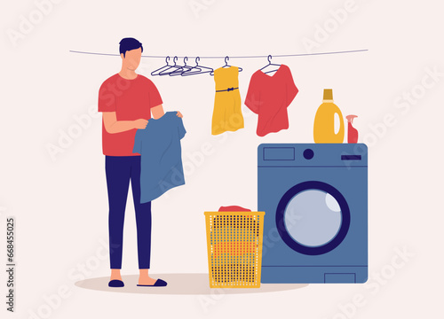 One Man Hanging Laundry With Cloth Hanger Beside Washing Machine. Full Length. Flat Design.