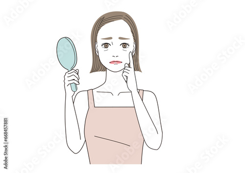 目尻の小じわを気にしている女性