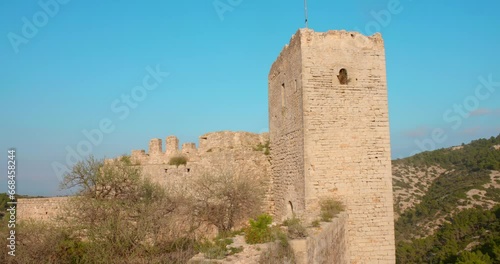 Ancient Remains Of Castillo de Pulpis In Valencian Community, Spain. sliding shot photo