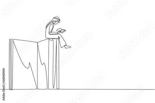 Continuous one line drawing Arabian man sitting on a big open book reading a book. Serious and focus learning increases insight. Book festival concept. Single line draw design vector illustration