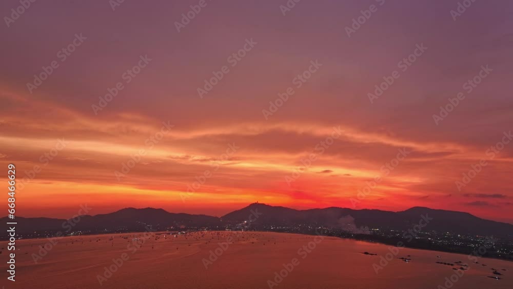 .aerial hyperlapse view amazing red sky in colorful sky above the island..Majestic sunset or sunrise landscape Amazing light of nature background. .gradient color texture fantastic sky texture. .aerial hyperlapse view amazing red sky in colorful sky above the island..Majestic sunset or sunrise landscape Amazing light of nature background. .gradient color texture fantastic sky texture.