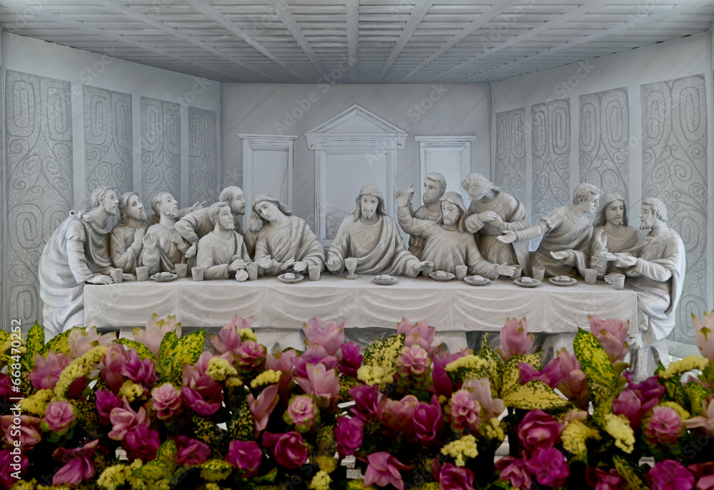 custom made wallpaper toronto digitalBANGKOK, THAILAND – OCTOBER 26, 2023: A marble statue with carving of the Last Supper in St.Theresa Catholic Church NongChok, Thailand.