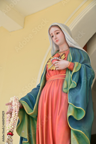 Close-up of Beautiful Statue of Our lady of grace virgin Mary located in the church, Thailand. selective focus.