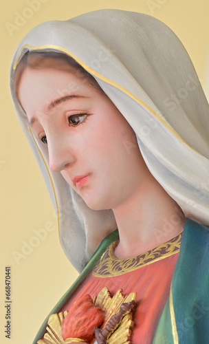 Close-up of Beautiful Statue of Our lady of grace virgin Mary located in the church, Thailand. selective focus.