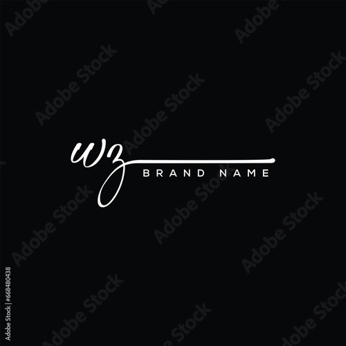 WZ letter beauty handwriting vector logo.  photo