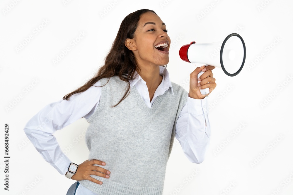 Funny Young beautiful woman People sincere emotions lifestyle concept. Mock up copy space. Screaming in megaphone. Funny Young beautiful woman People sincere emotions lifestyle concept. Mock up copy space. Screaming in megaphone.